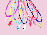 Slim surfer fish necklace