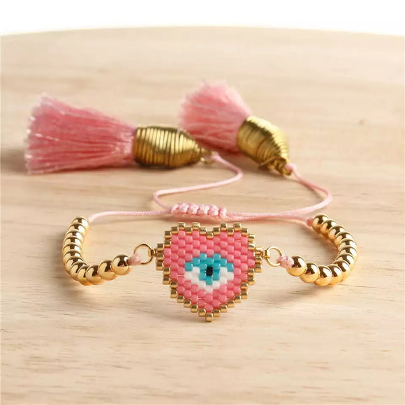 Evil eye heart shape pink beads bracelet with tassels