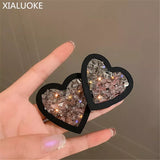 Exaggerated irregular glass heart shaped stud light weight earrings