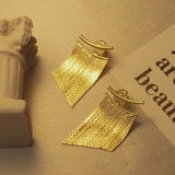 Fashion statement tassel Gold earrings