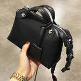 Black Bag with Flower Tassel