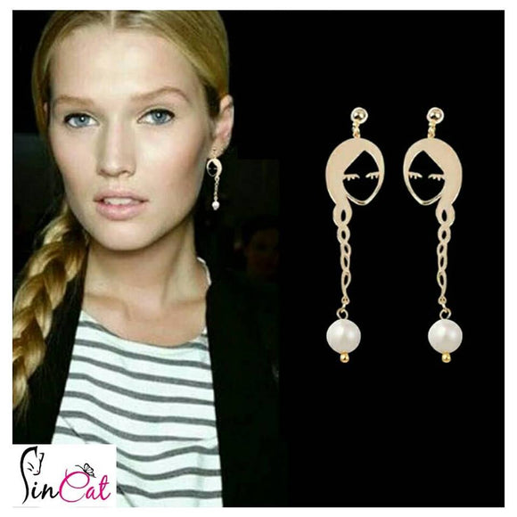 Golden braid metal earrings