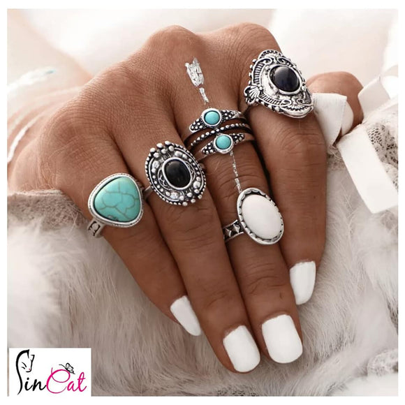 Blue black white rings set