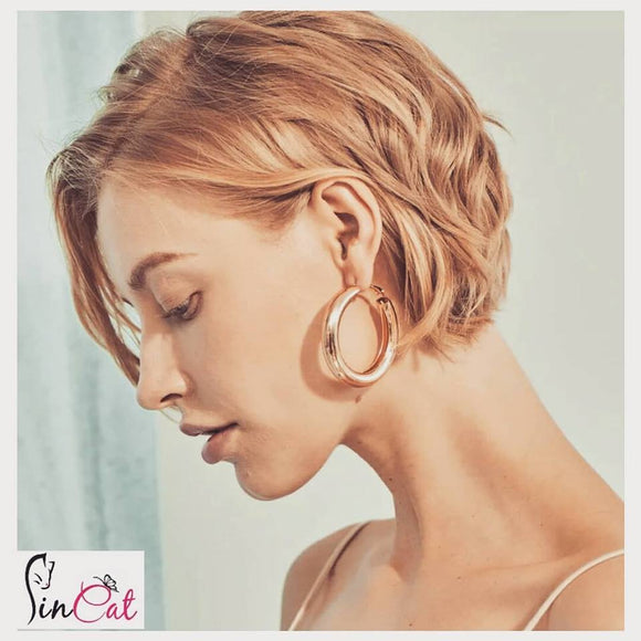 Rose gold hoop metallic earrings