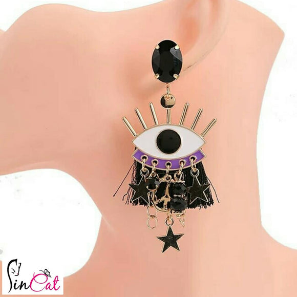 Eye statement black earrings with tassels
