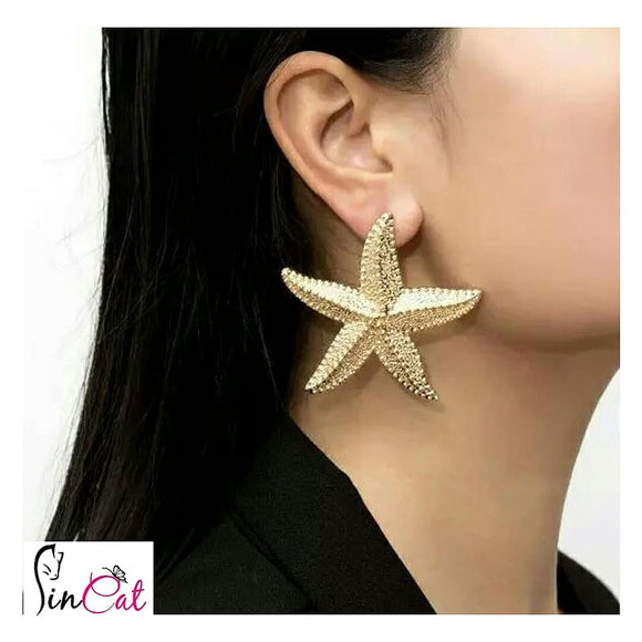 Exaggerated metallic starfish earrings