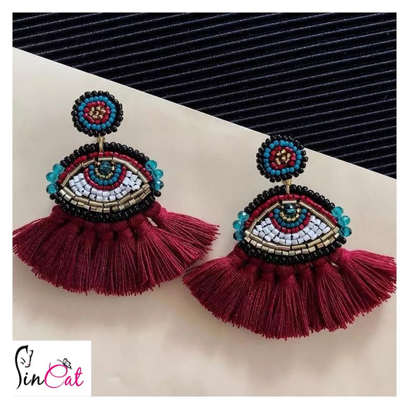 Wine red tassel eye hand made beads earrings