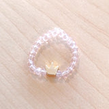 Transparent elastic beads rings