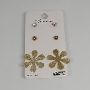 set of three gold flower earrings