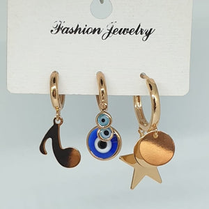 set of three nickel free gold misic note eye star drop earrings