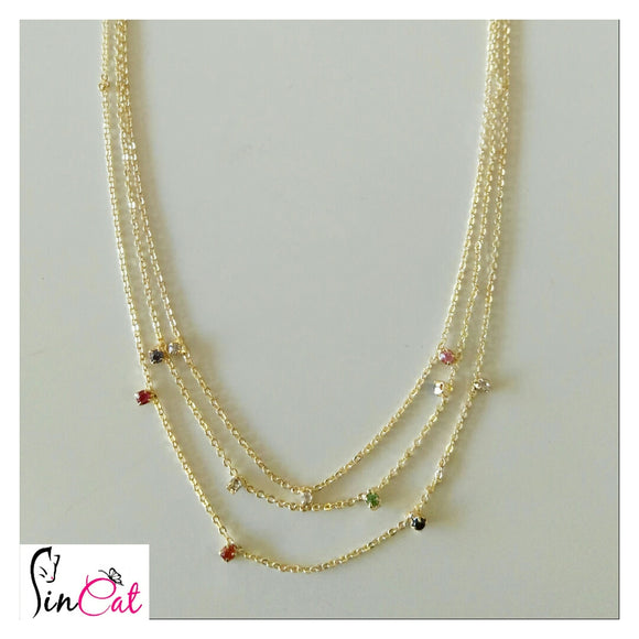 Multilayer golden necklace with zircon