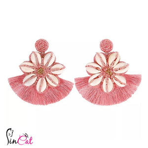 Pink beaded earrings with shell tassel