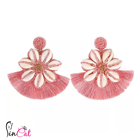 Pink beaded earrings with shell tassel
