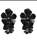 black flower earring statement